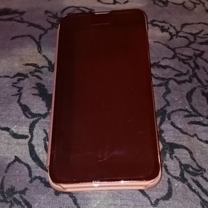 Mirrored, open faced, cell phone case.